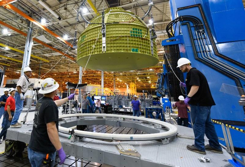 At the NASA Michoud Assembly Facility in Louisisana, Lockheed martin technicians have completed construction of the first Orion vapsule structure that will carry humans to deep space n Exploration Mission-2. Credit NASA